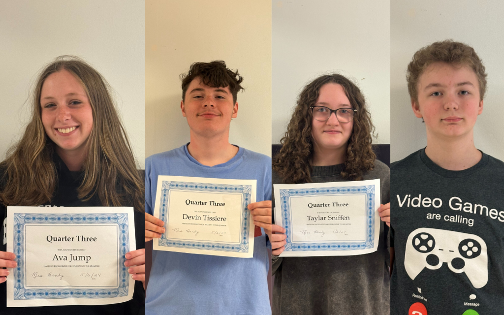 four students hold their honor certificates