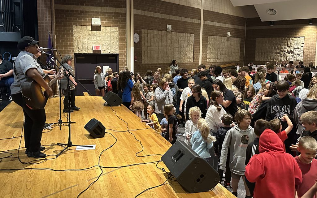 band performs for SSCS student dancing 