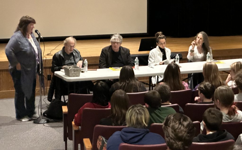 panel of poets are introduced