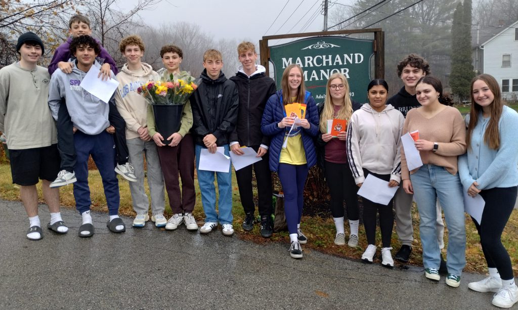 group of students outside Marchand Manor