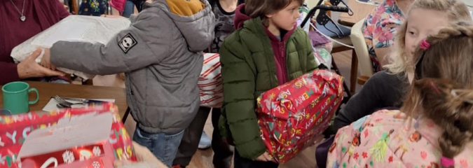 Elementary Children Spread Belated Holiday Cheer at Marchand Manor